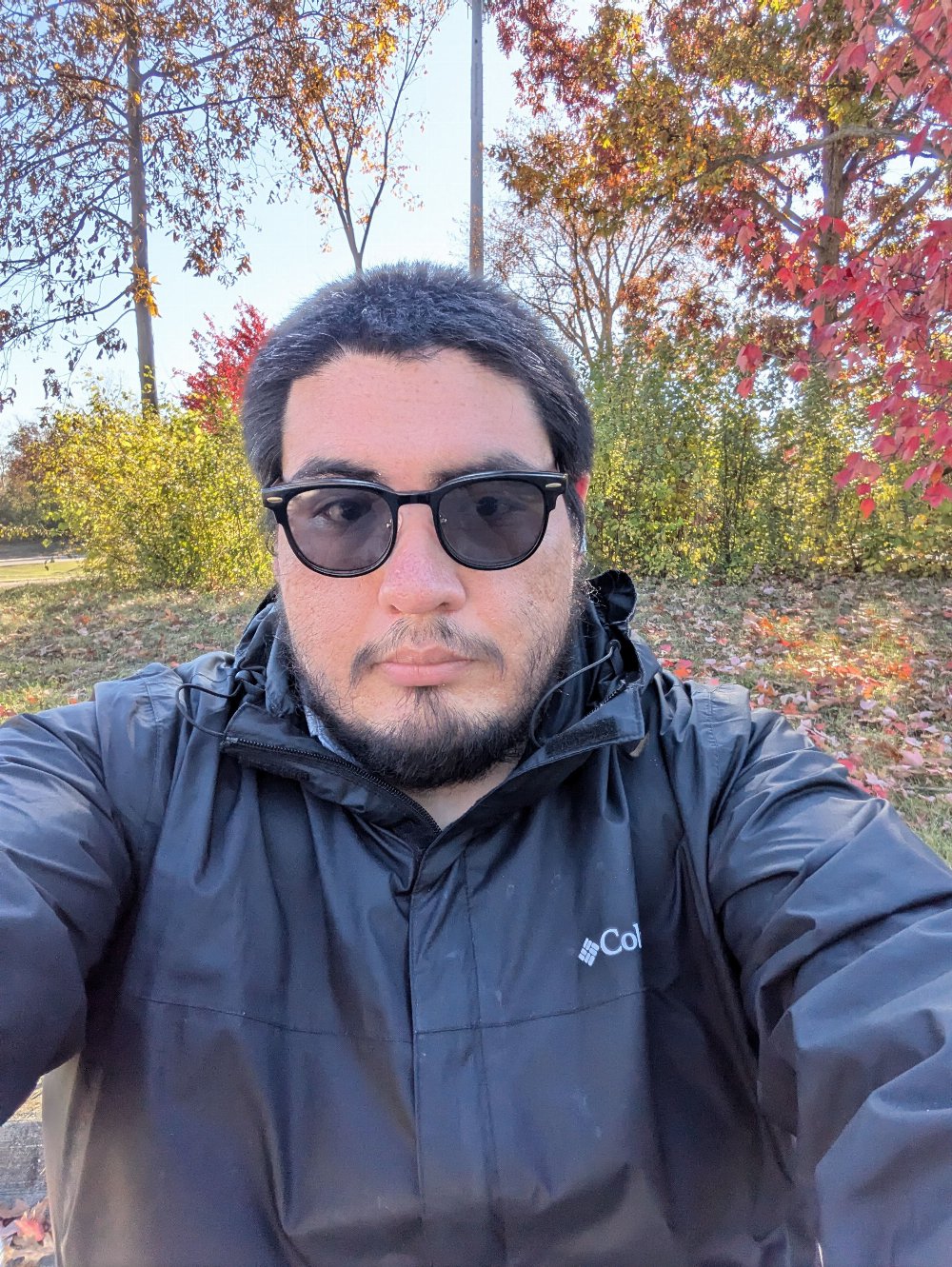 Ruben Ponce outdoors among fall trees